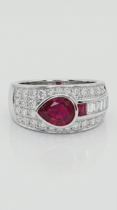 Bespoke 18ct white gold ring with a pear-cut ruby and diamonds, remodelled by Syna Jewellery using the client’s own gold and gemstones
